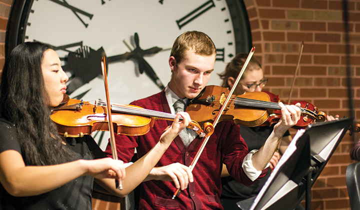 Students playing instruments at WLC Christmas